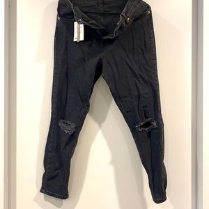 Asos black skinny, denim jeans with ripped knees. 32 inches waist and 32 length